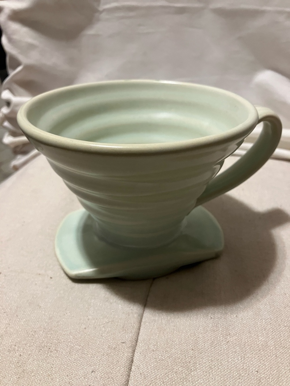 Like new 1 of 3 handcrafted ceramic vase or candle holder by Figaro. Very lite
